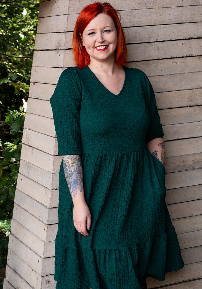 Front view of Owena Bottle Green 2 Tiered Dress