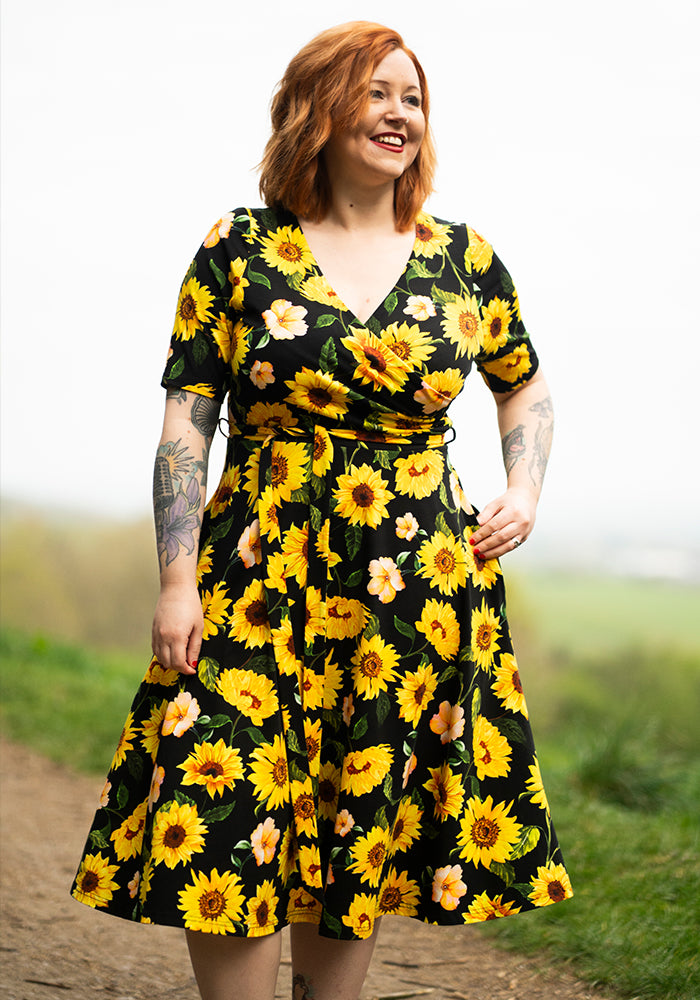 Front view of Philomena Black Sunflower Print Cotton Swing Dress