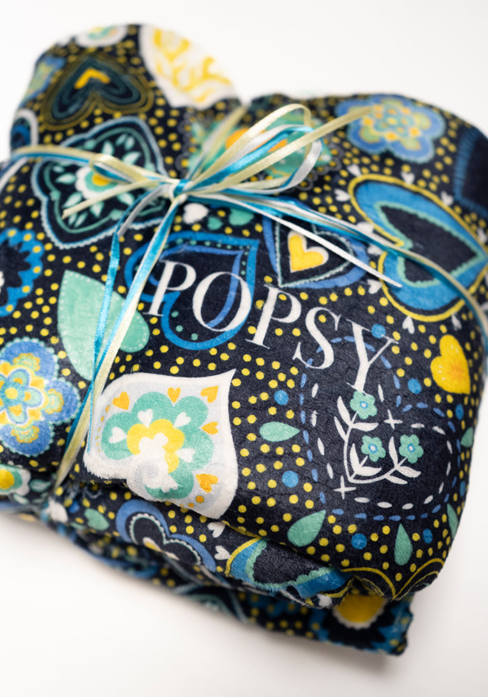 Third angle of Pop-under Folklore Hearts Print Plush Blanket