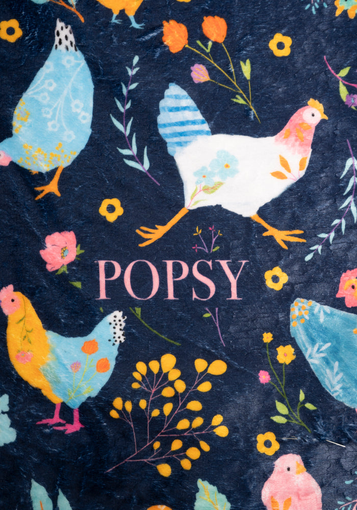 Second angle of Pop-under Henny Penny Print Plush Blanket
