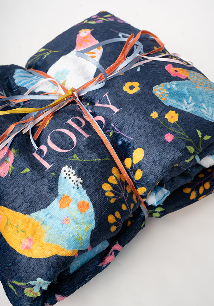 Fourth angle of Pop-under Henny Penny Print Plush Blanket