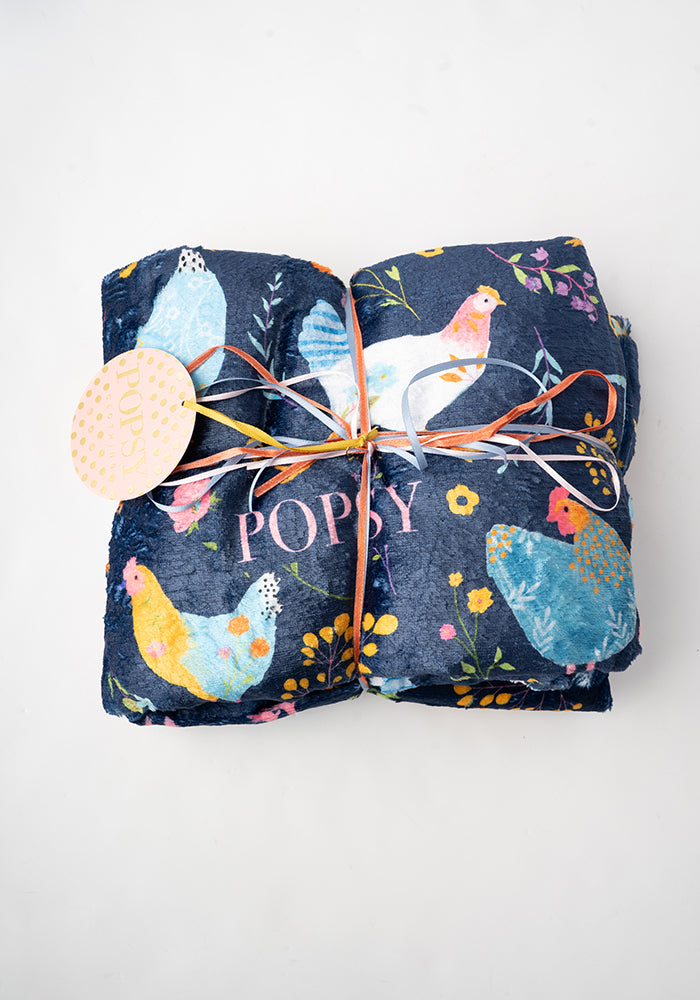 Front view of Pop-under Henny Penny Print Plush Blanket