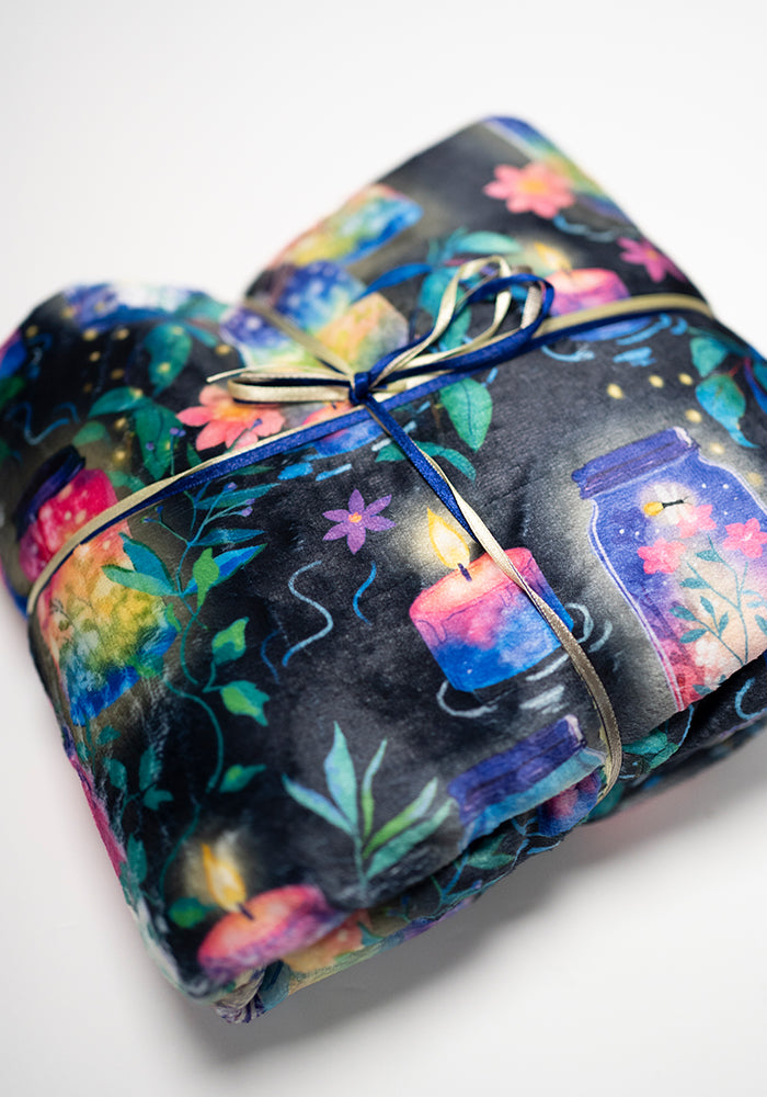 Front view of Jars &amp; Candle Print Plush Throw Blanket (Pop-Under)