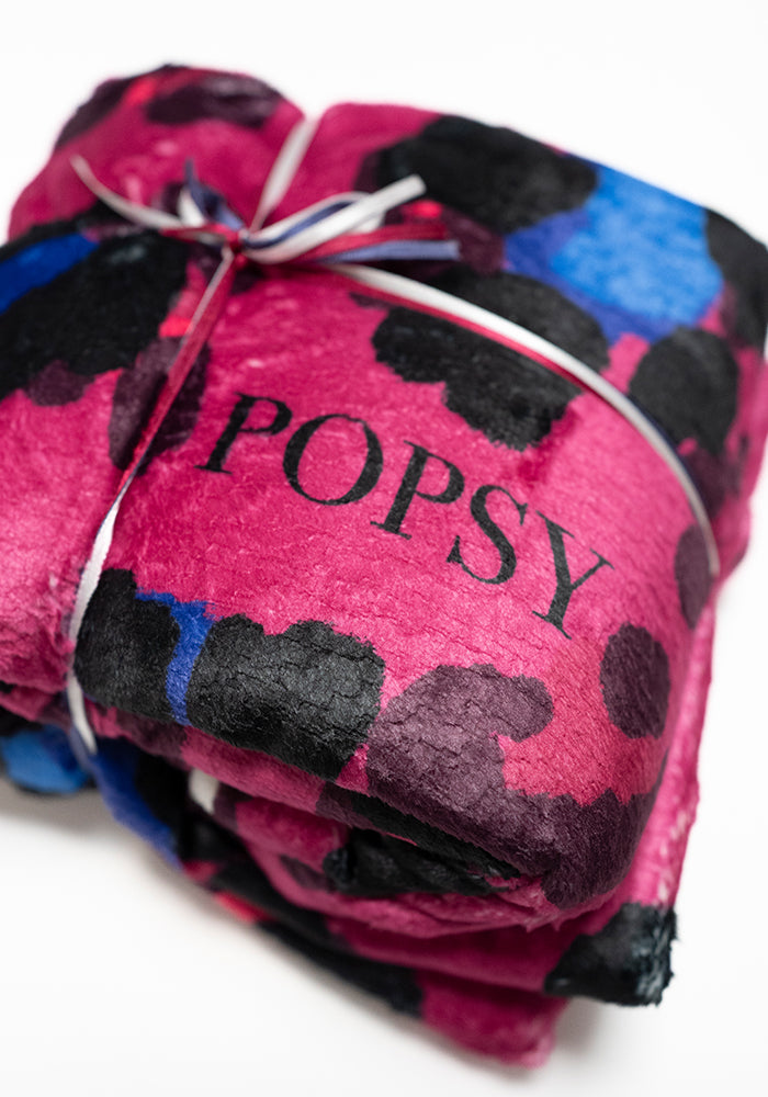 Third angle of Pop-under Large Scale Pink Animal Print Plush Blanket