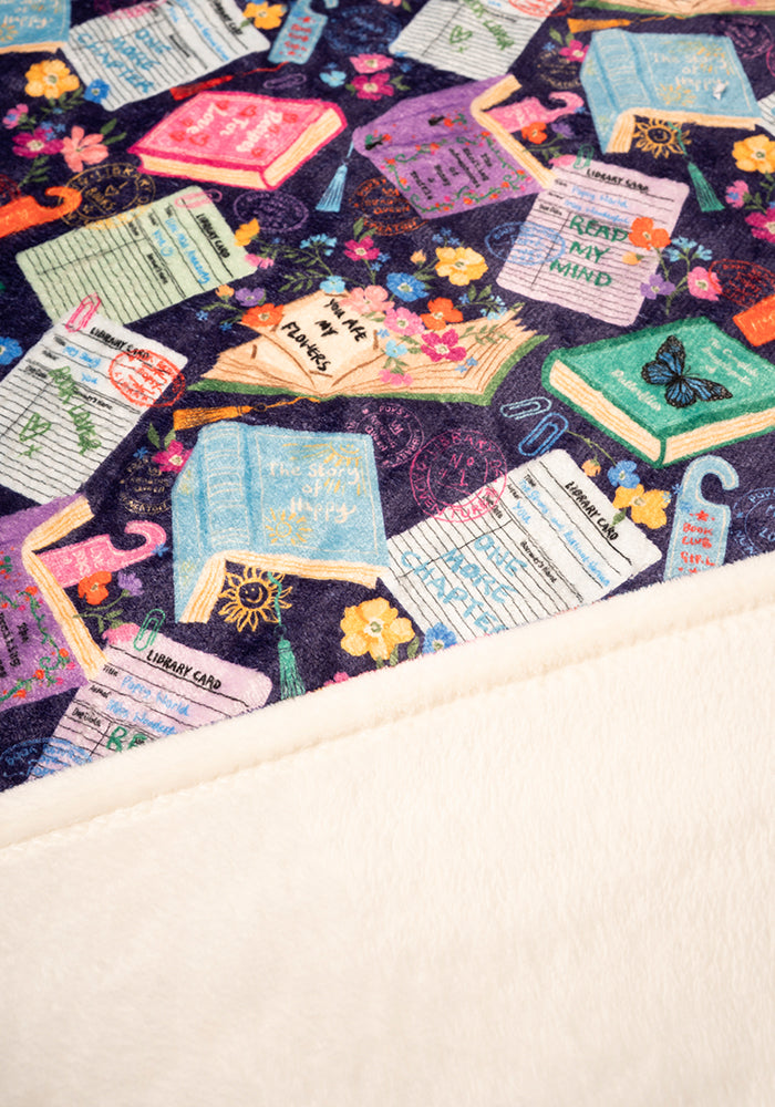 Sixth angle of Purple Library Books Print Plush Blanket (Pop-Under), library Book Print Plush Blanket.