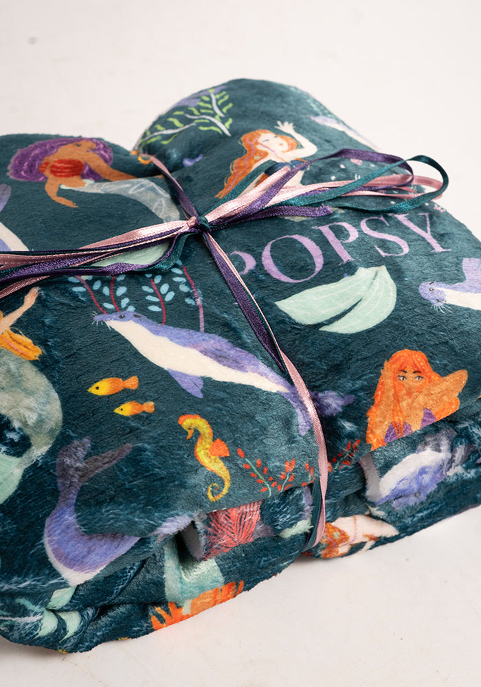 Front view of Pop-under Mermaids &amp; Seals Print Plush Blanket