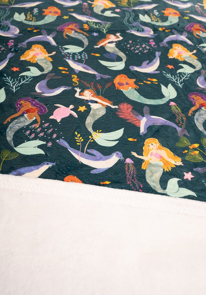 Third angle of Pop-under Mermaids &amp; Seals Print Plush Blanket