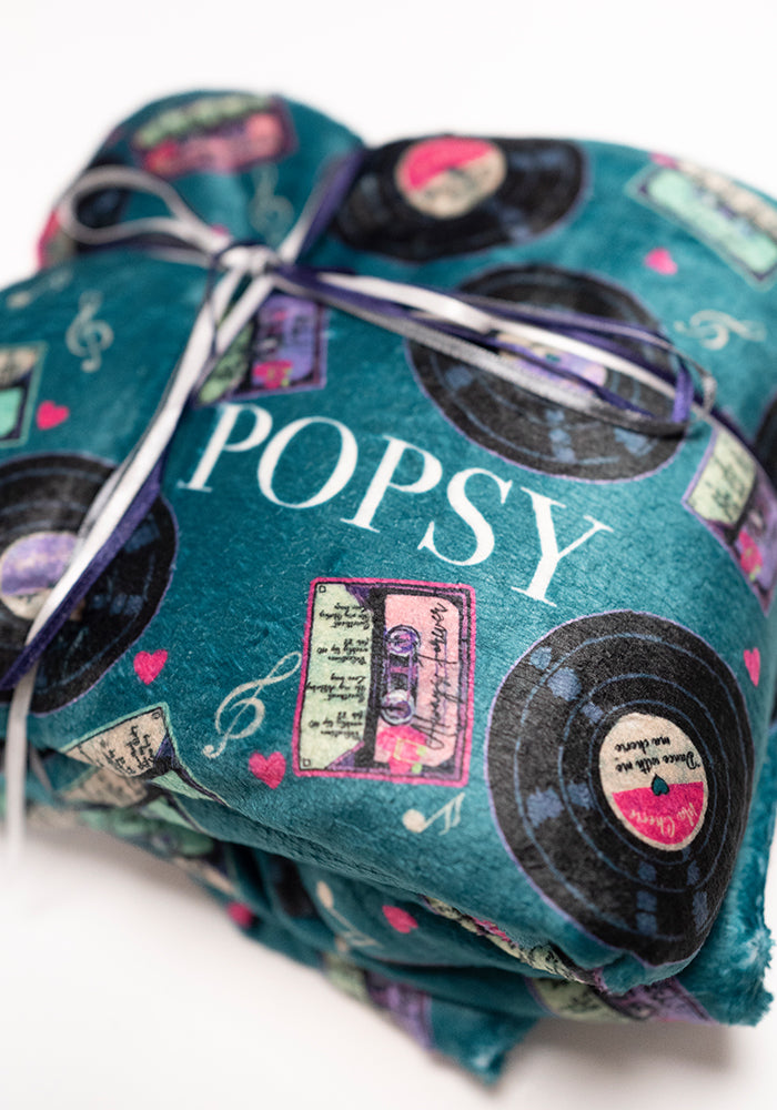 Third angle of Pop-under Mixtapes Print Plush Blanket