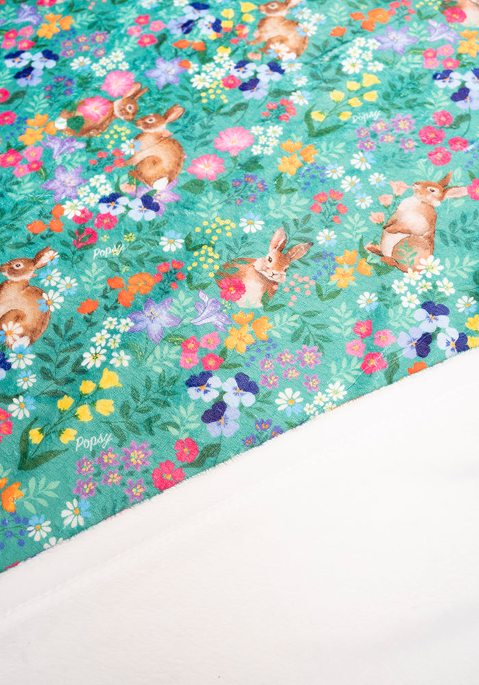 Sixth angle of Rabbit Garden Print Plush Throw Blanket (Pop-Under)