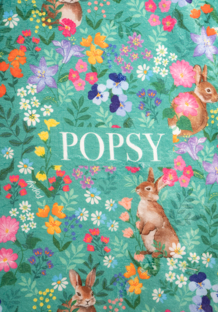 Second angle of Rabbit Garden Print Plush Throw Blanket (Pop-Under)