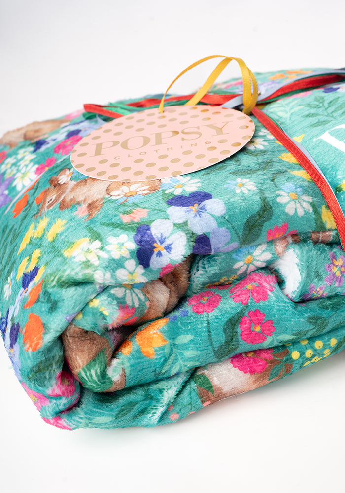 Fifth angle of Rabbit Garden Print Plush Throw Blanket (Pop-Under)