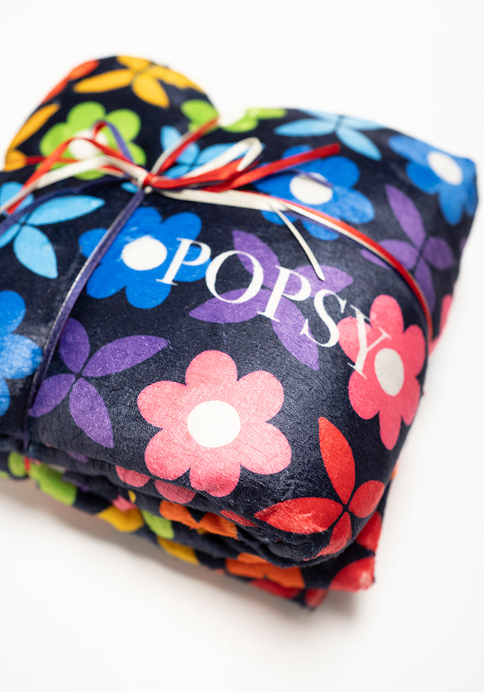 Third angle of Pop-under Retro Rainbow Floral Print Plush Blanket