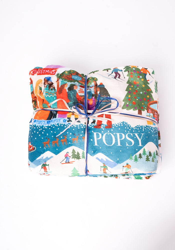 Pop-under Ski Village Print Plush Blanket