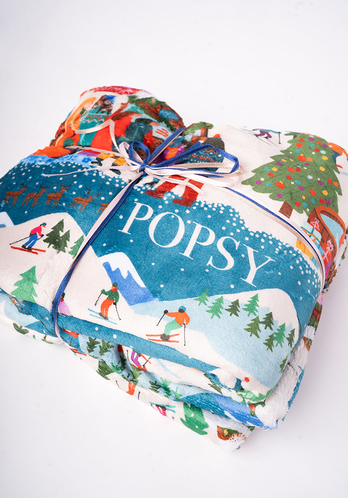 Pop-under Ski Village Print Plush Blanket