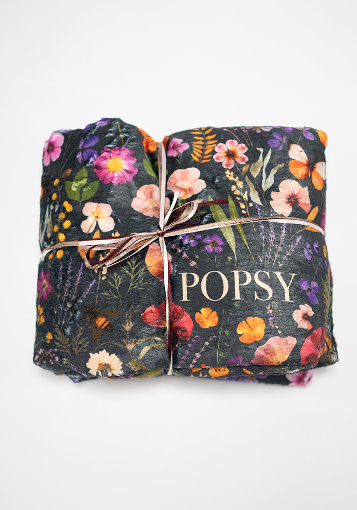Fourth angle of Pressed Floral Pop-under Plush Blanket