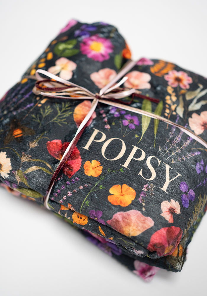 Front view of Pressed Floral Pop-under Plush Blanket