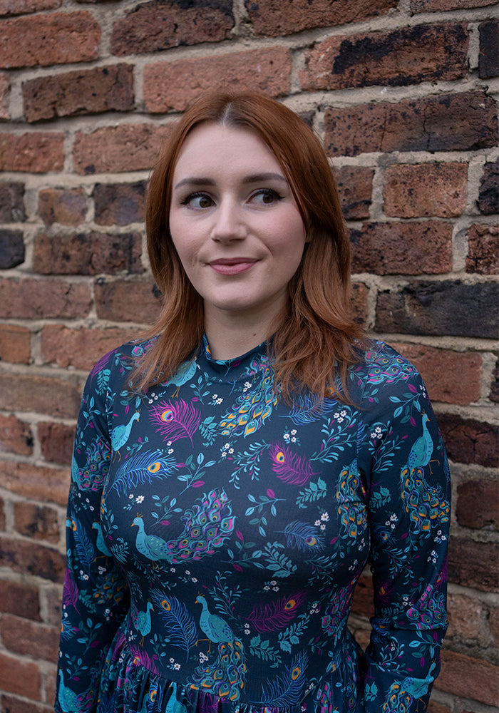 Fourth angle of Rosalie Peacock Print Tiered Hem Midi Dress