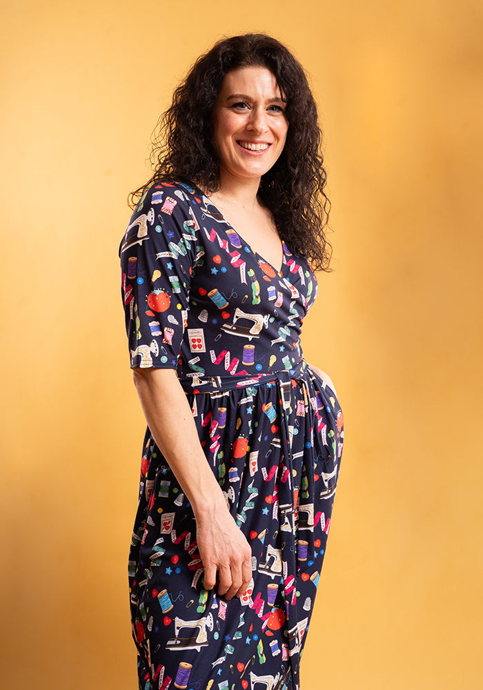 Fifth angle of Sadira Sewing Print Midi Dress, our jersey is a smooth, stretchy fabric known for its comfort and ease.