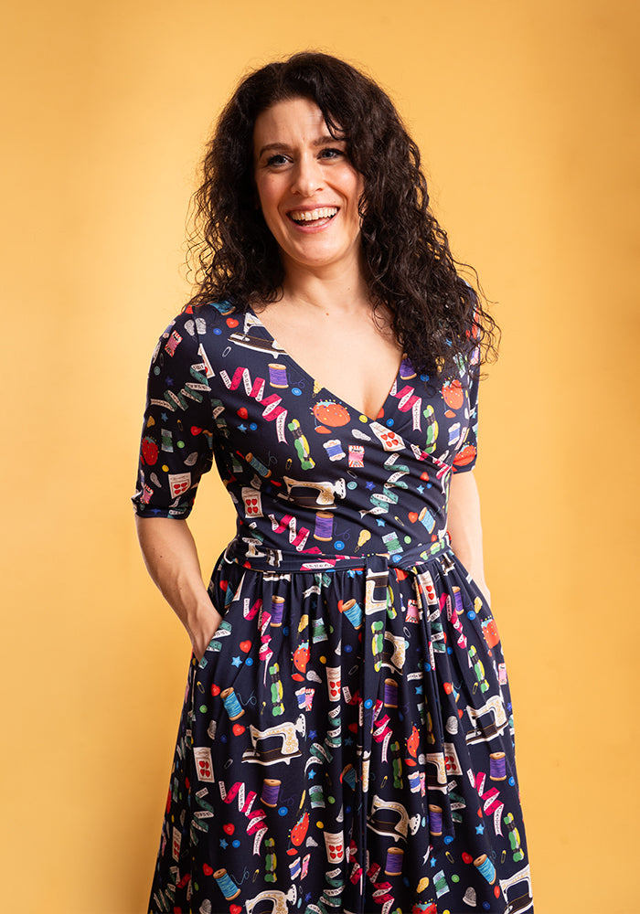 Third angle of Sadira Sewing Print Midi Dress, our jersey is a smooth, stretchy fabric known for its comfort and ease.