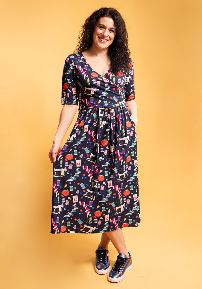 Front view of Sadira Sewing Print Midi Dress, our jersey is a smooth, stretchy fabric known for its comfort and ease.