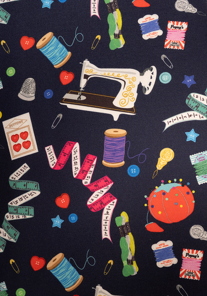 Second angle of Sadira Sewing Print Midi Dress, our jersey is a smooth, stretchy fabric known for its comfort and ease.