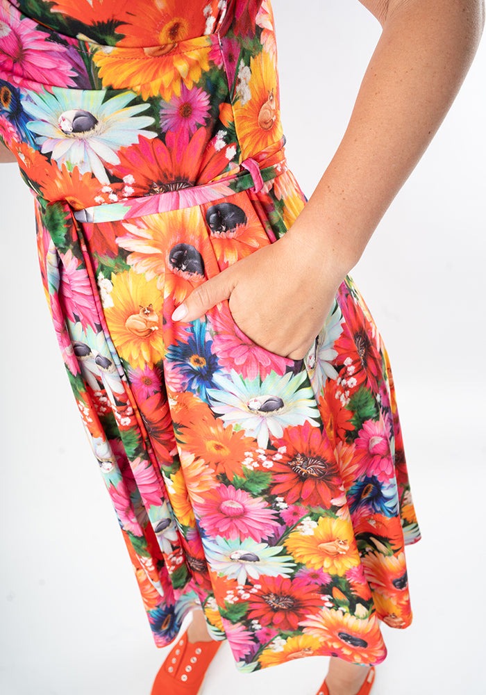 Colourful floral and cat dress with hand in pocket
