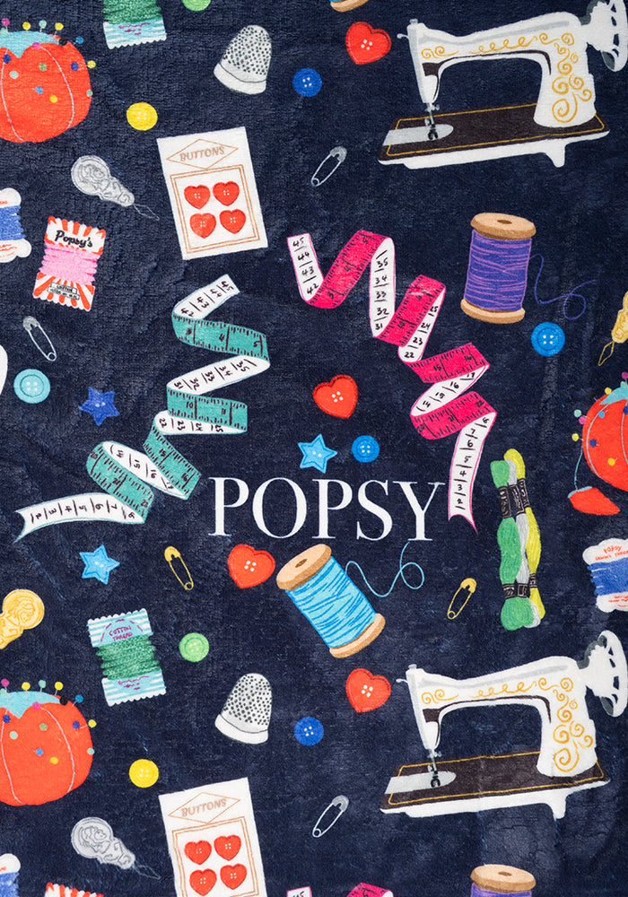 Second angle of Sewing &amp; Haberdashery Print Pop-under Plush Blanket