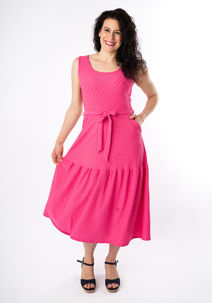Front view of Shae Cerise Oval Textured Tiered Hem Midi Dress