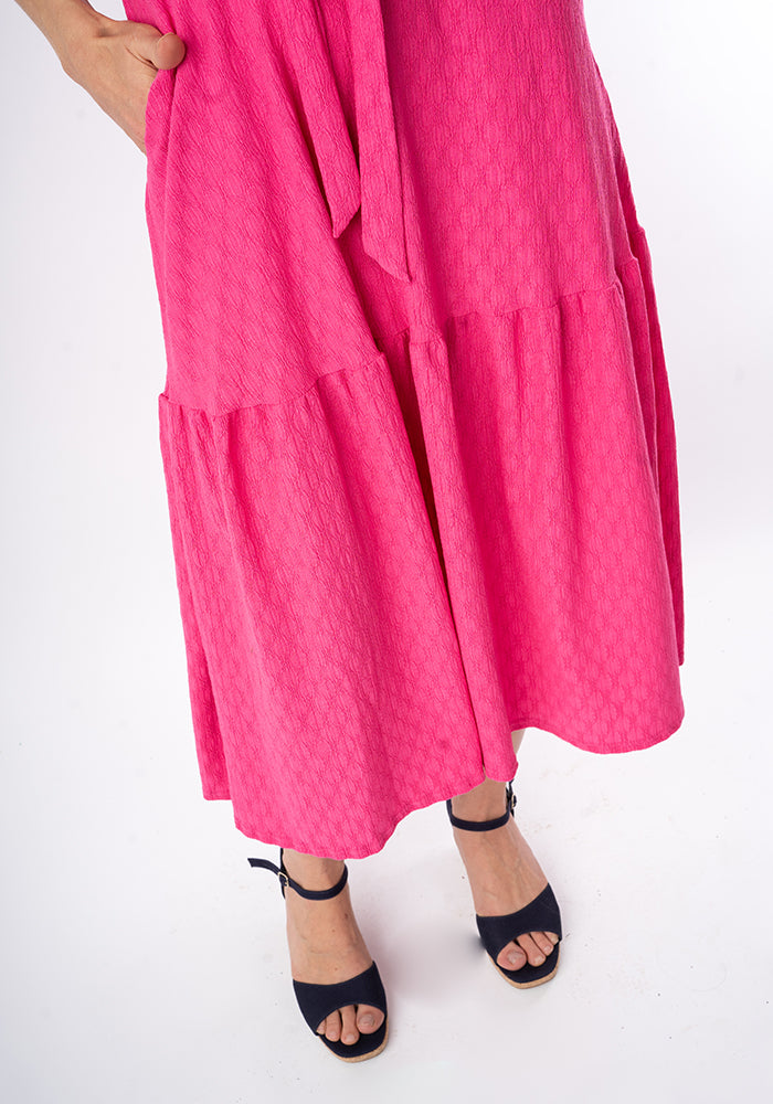 Third angle of Shae Cerise Oval Textured Tiered Hem Midi Dress