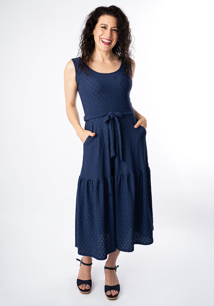 Third angle of Shae Navy Oval Textured Tiered Hem Midi Dress