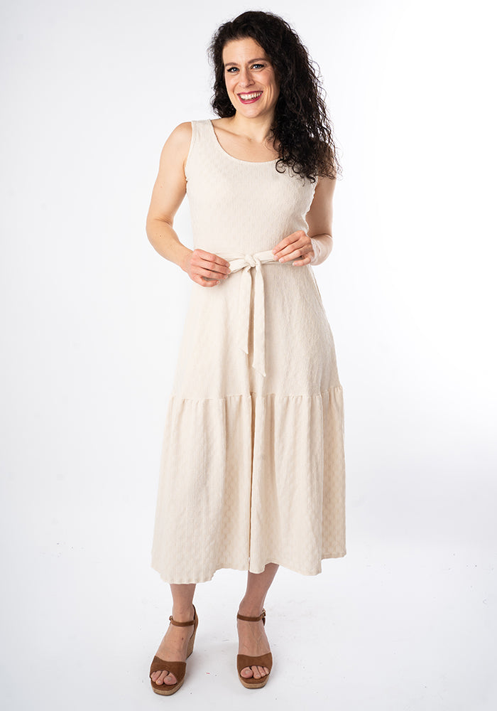 Front view of Shae Cream Oval Textured Tiered Hem Midi Dress