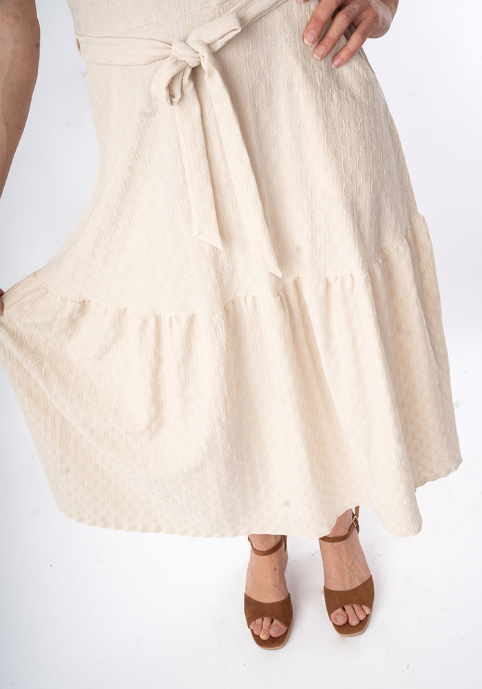 Third angle of Shae Cream Oval Textured Tiered Hem Midi Dress