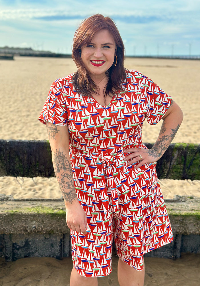 Front view of Shore Red Sailboats Print Jersey Playsuit