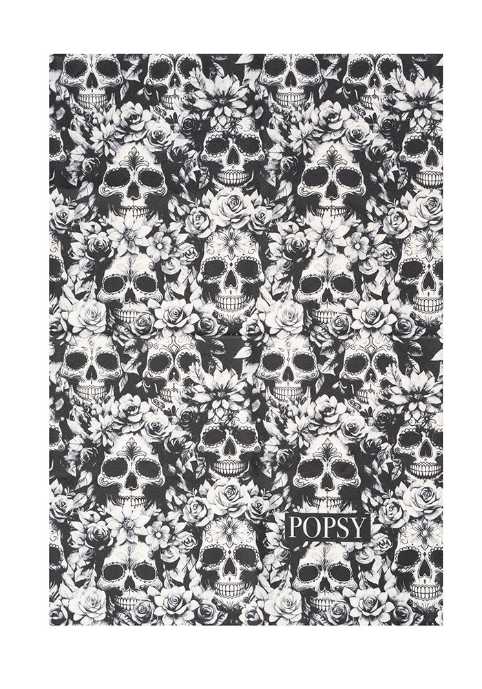 Front view of Mono Skulls Print Tea Towel