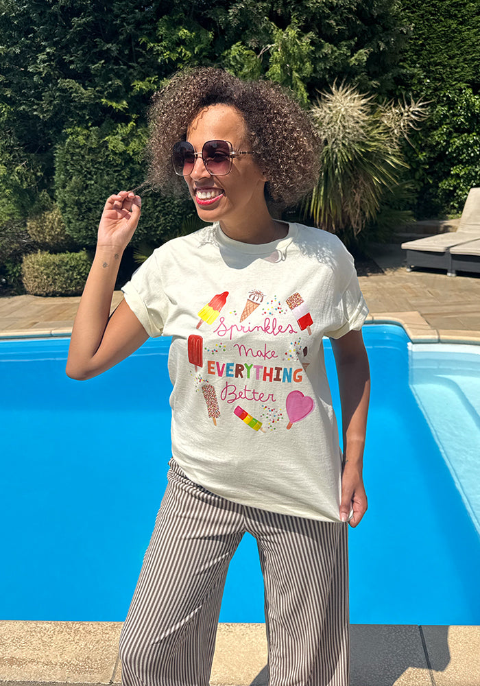 Fifth angle of Sprinkles Graphic Print T-Shirt (Cream), a cream tee with "Sprinkles Make Everything Better" positive slogan.