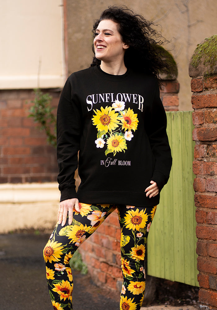 Eighth angle of Sunflower Print Sweatshirt (Black), sunflower Print Sweatshirt (Black) Your go-to feel-good layer.