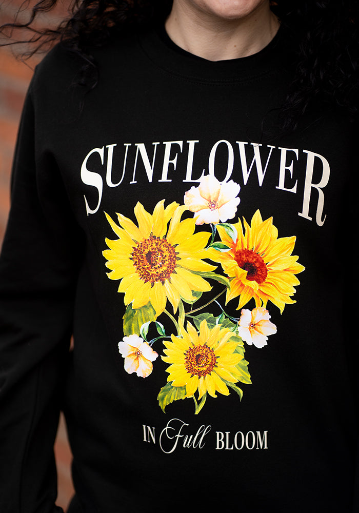 Seventh angle of Sunflower Print Sweatshirt (Black), sunflower Print Sweatshirt (Black) Your go-to feel-good layer.