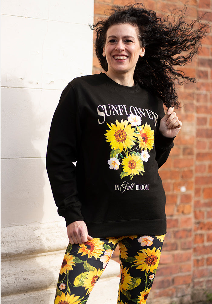 Fifth angle of Sunflower Print Sweatshirt (Black), sunflower Print Sweatshirt (Black) Your go-to feel-good layer.