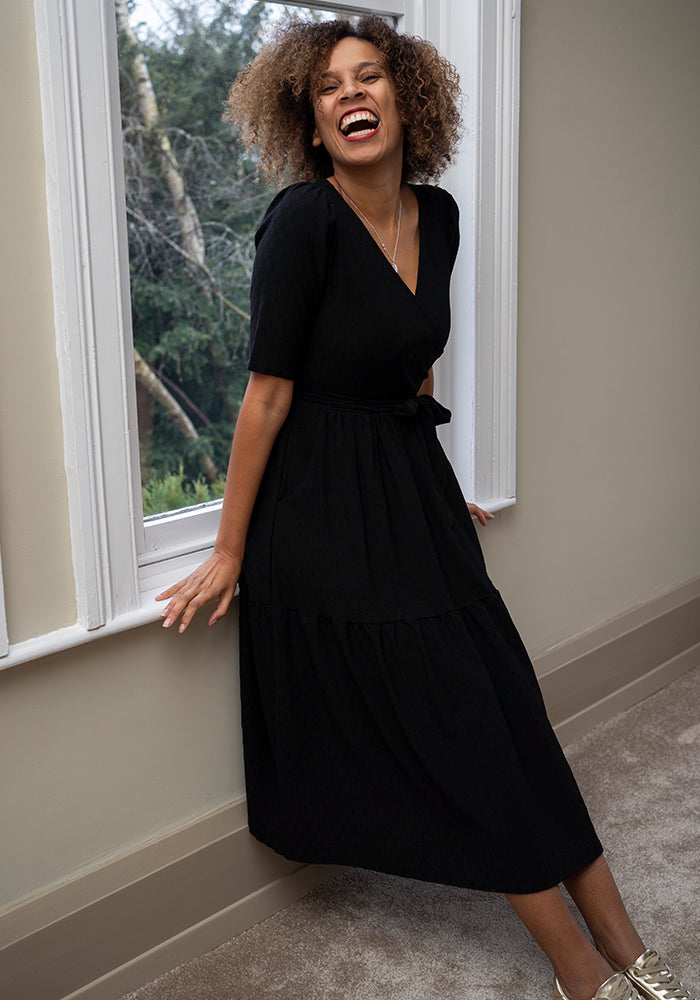 Fifth angle of Tate Black Oval Textured Tiered Hem Midi Dress