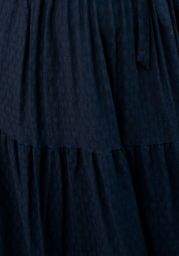 Second angle of Tate Black Oval Textured Tiered Hem Midi Dress