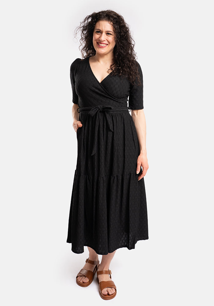 Eighth angle of Tate Black Oval Textured Tiered Hem Midi Dress