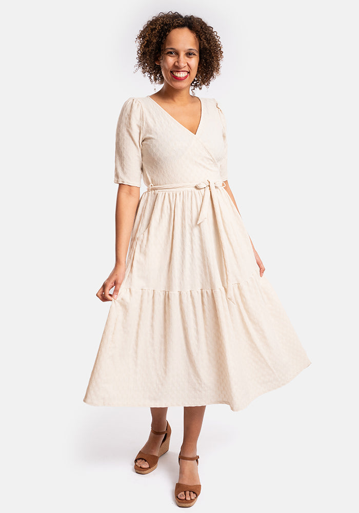 Front view of Tate Cream Oval Textured Tiered Hem Midi Dress