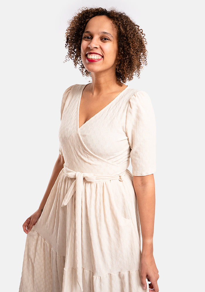 Third angle of Tate Cream Oval Textured Tiered Hem Midi Dress