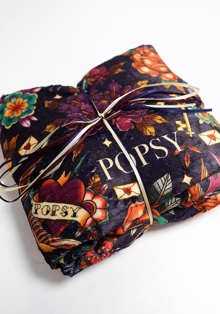 Front view of Purple Tattoo Print Plush Throw Blanket (Pop-Under)