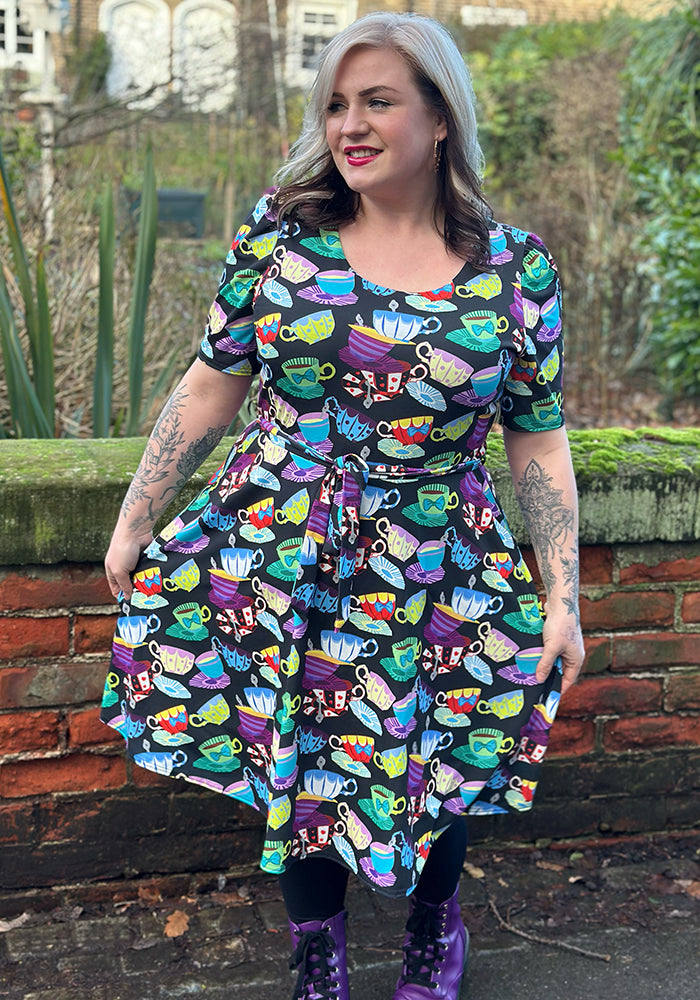 Eighth angle of Tay Tea Cup Stack Print Dress, our jersey is a smooth, stretchy fabric known for its comfort and ease.
