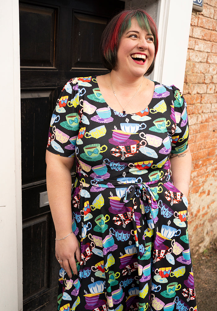 Sixth angle of Tay Tea Cup Stack Print Dress, our jersey is a smooth, stretchy fabric known for its comfort and ease.