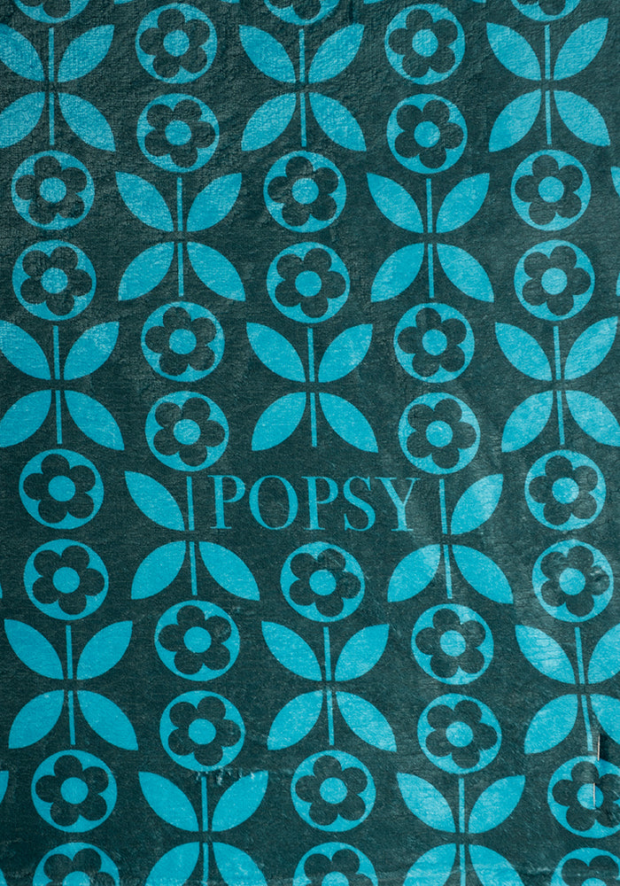 Second angle of Teal Retro Flower Print Pop-under Plush Blanket