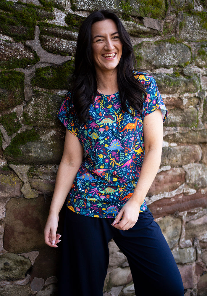 Third angle of Tess Teal Dinosaur Print Extended Shoulder Top