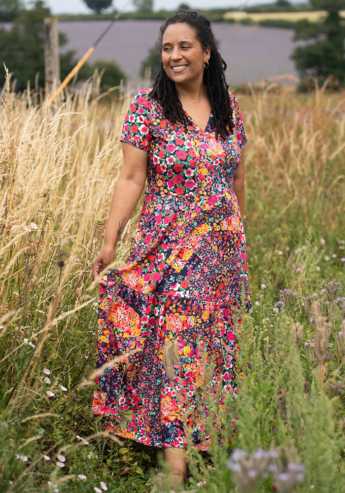 Front view of Theresa Patchwork Floral Print Tiered Hem Midaxi Dress