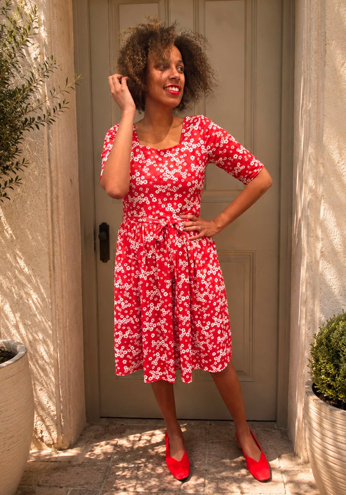 Front view of Thia Red Ditsy Floral Print Dress, bursting with vintage-inspired charm.